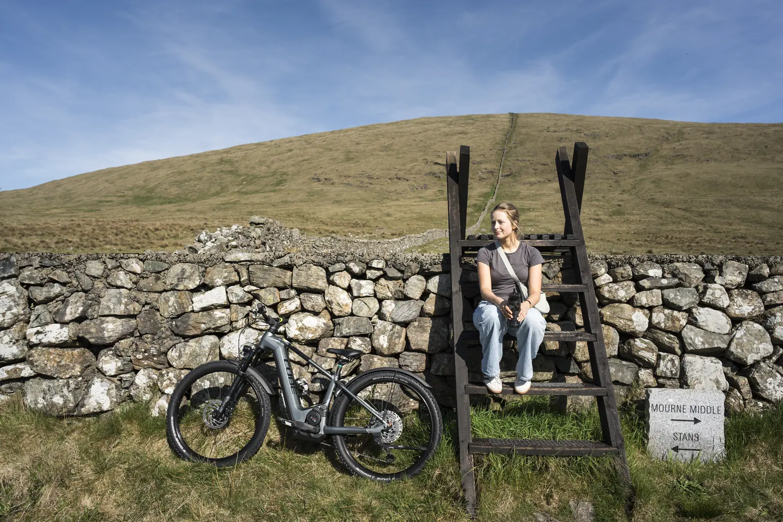 A cyclist at the Mourne Wall near Spelga Dam