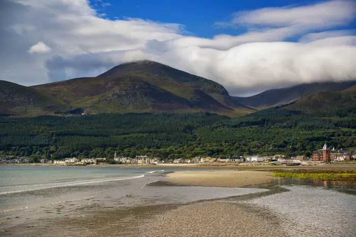 A view of Slieve Donard and the Mourne Mountains from the beach at Newcastle